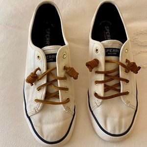 White Sperry slip on sneakers